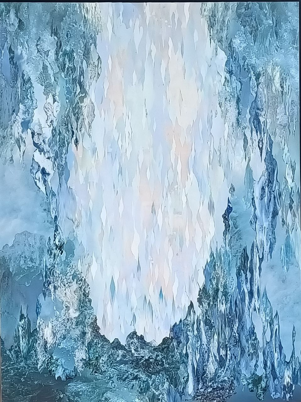 A white vertical flow descends through blue icy textures.